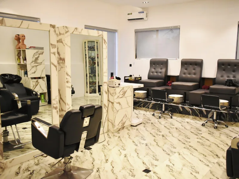 Hair salon styling stations at Facial Bar, Victoria Island, Lagos